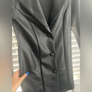 Black long women’s pleather 3 button jacket. Size small